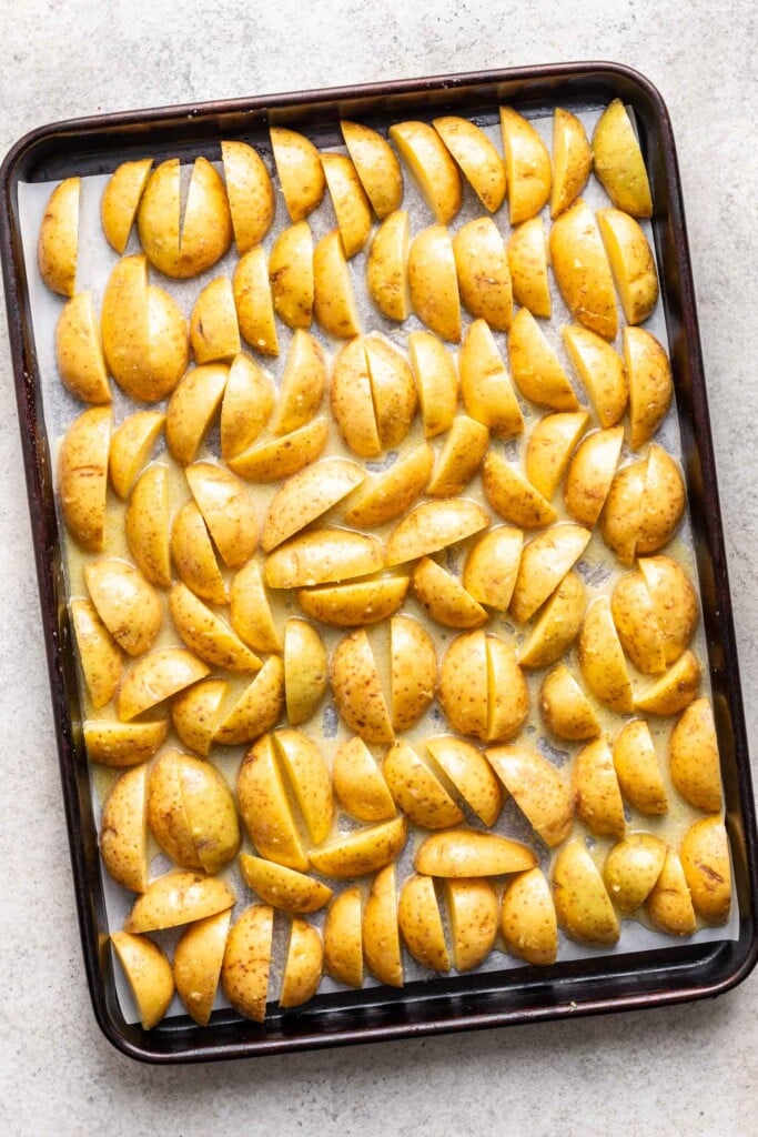 cut potatoes on a sheet pan