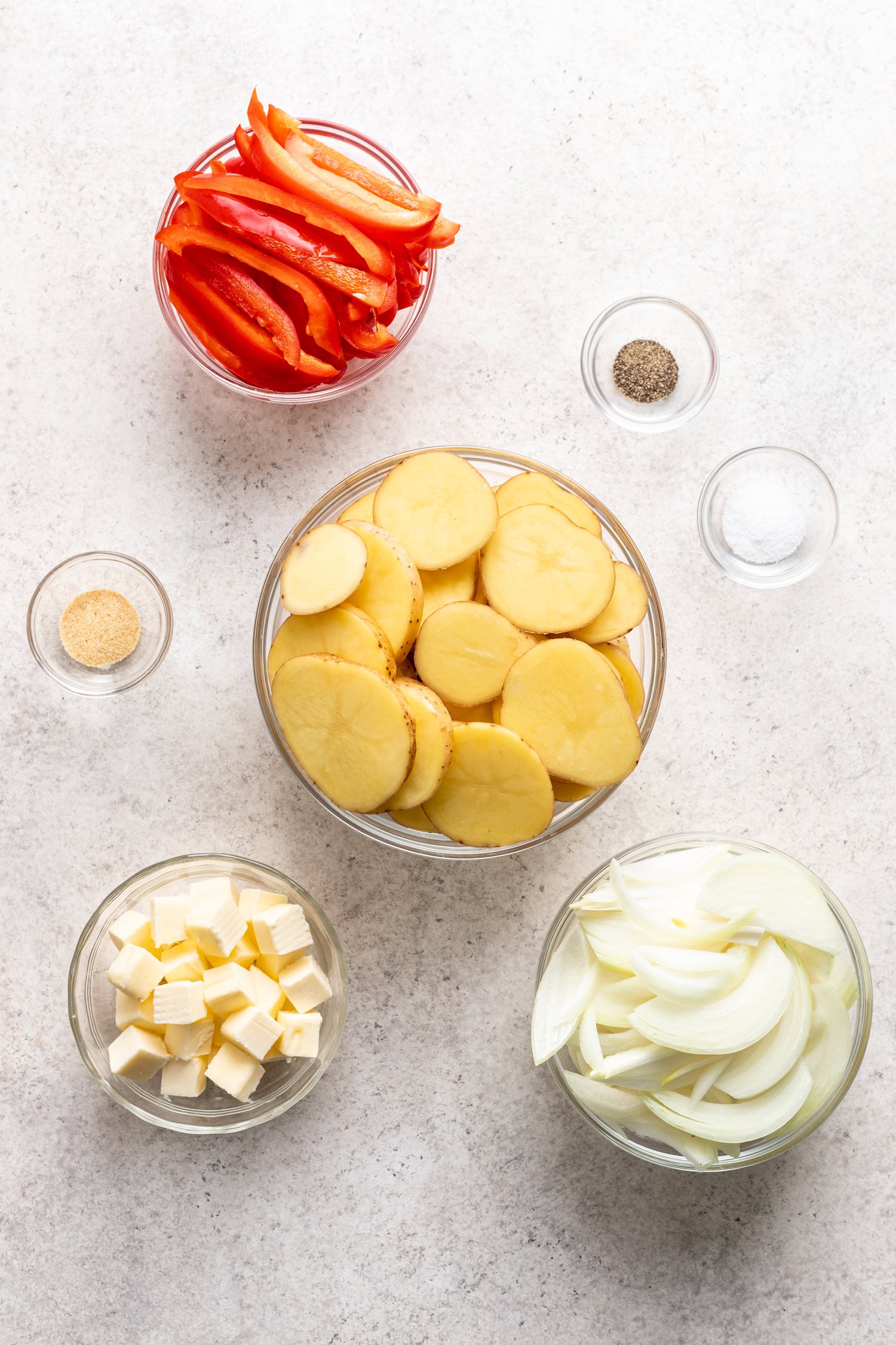 Ingredients in bowls on a grey background