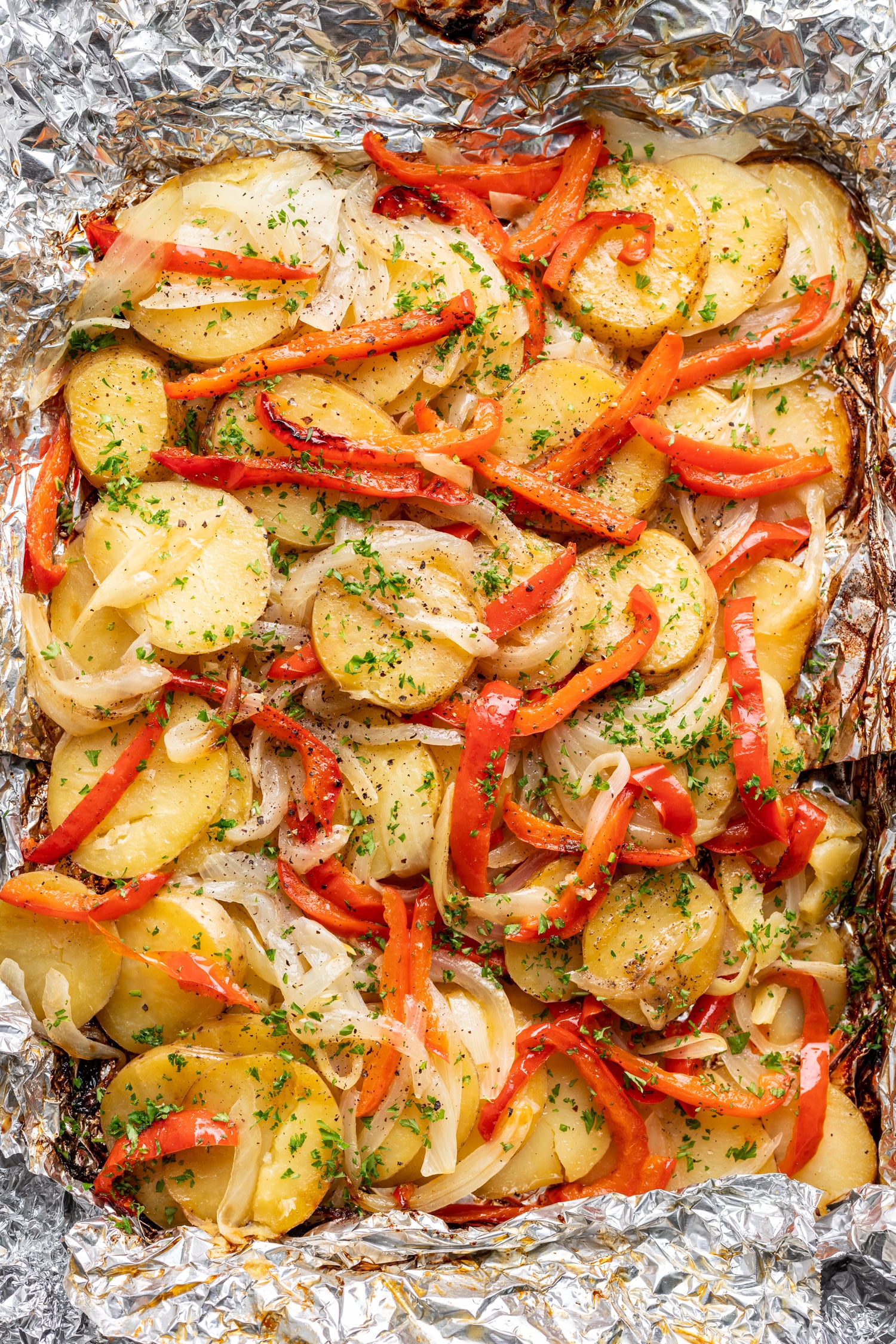 grilled potatoes, onions, bell peppers in foil