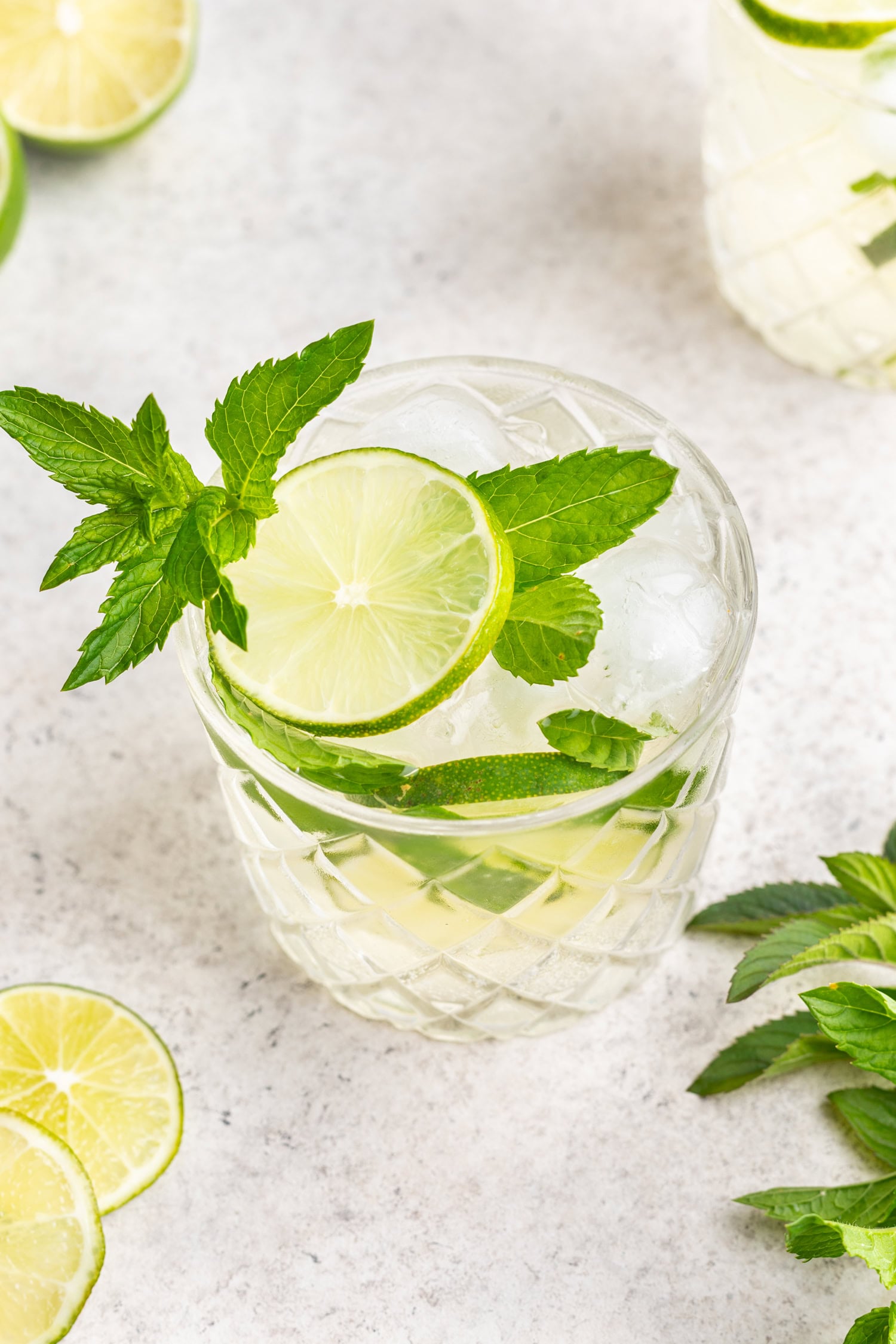fresh lime and mint in a cocktail