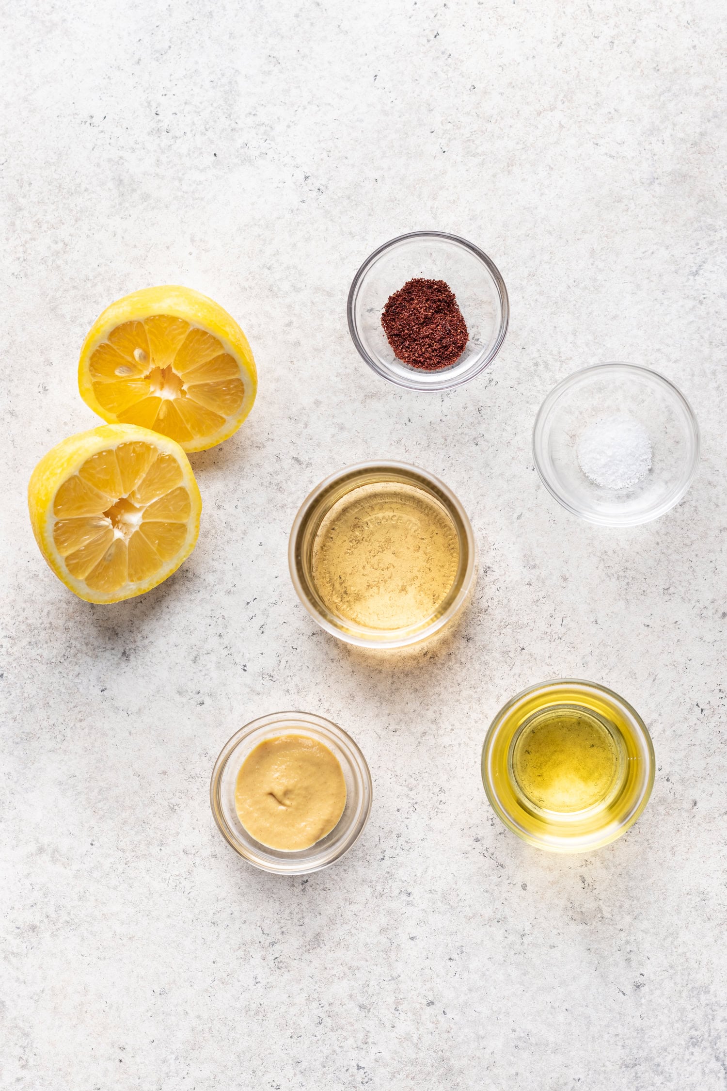 bowls of ingredients on a grey background