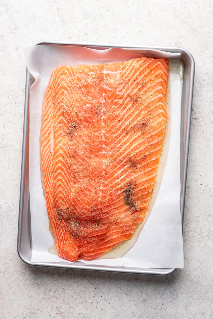 large piece of salmon on a sheet pan