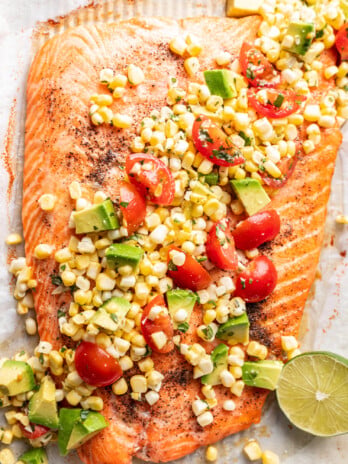 fresh corn salsa spooned over salmon