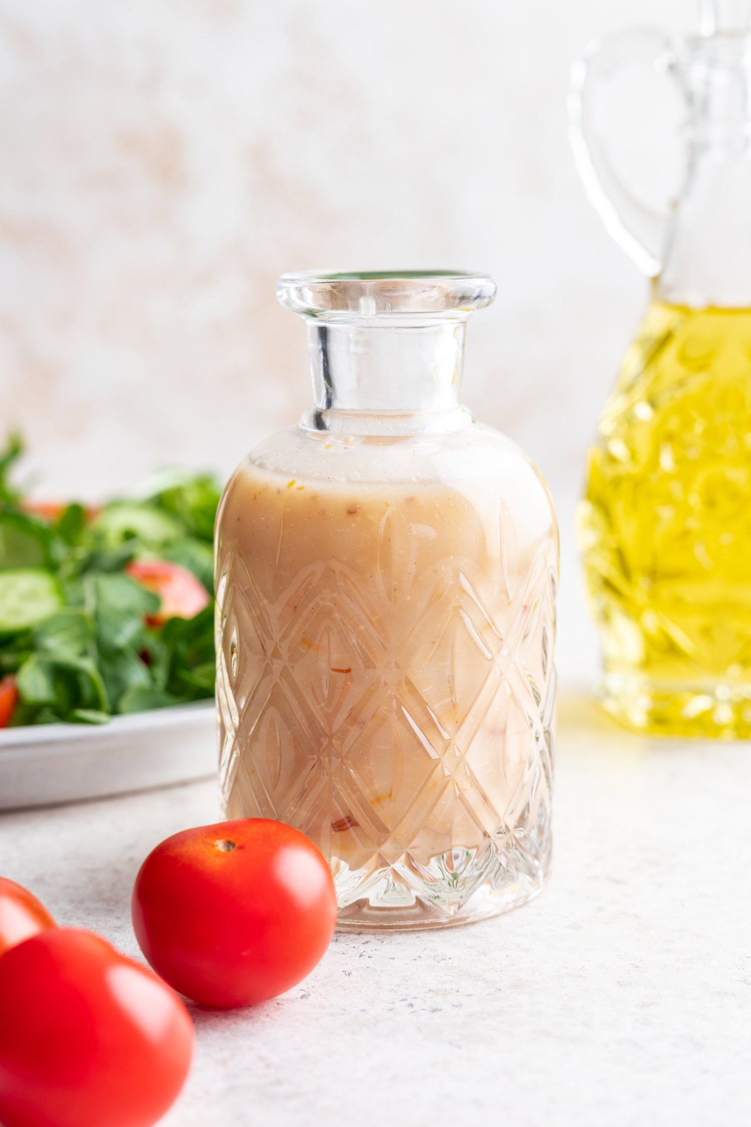 glass jar full of dressing