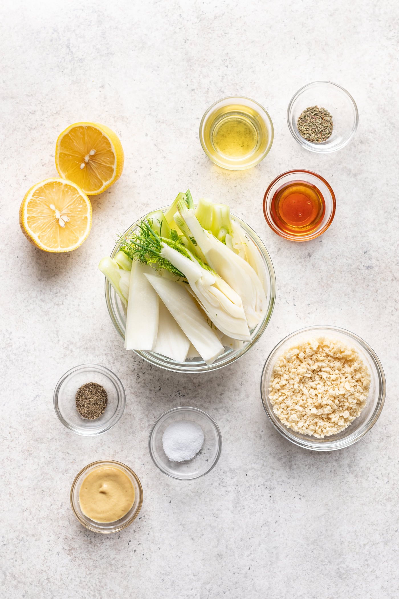 bowls of ingredients on a grey background