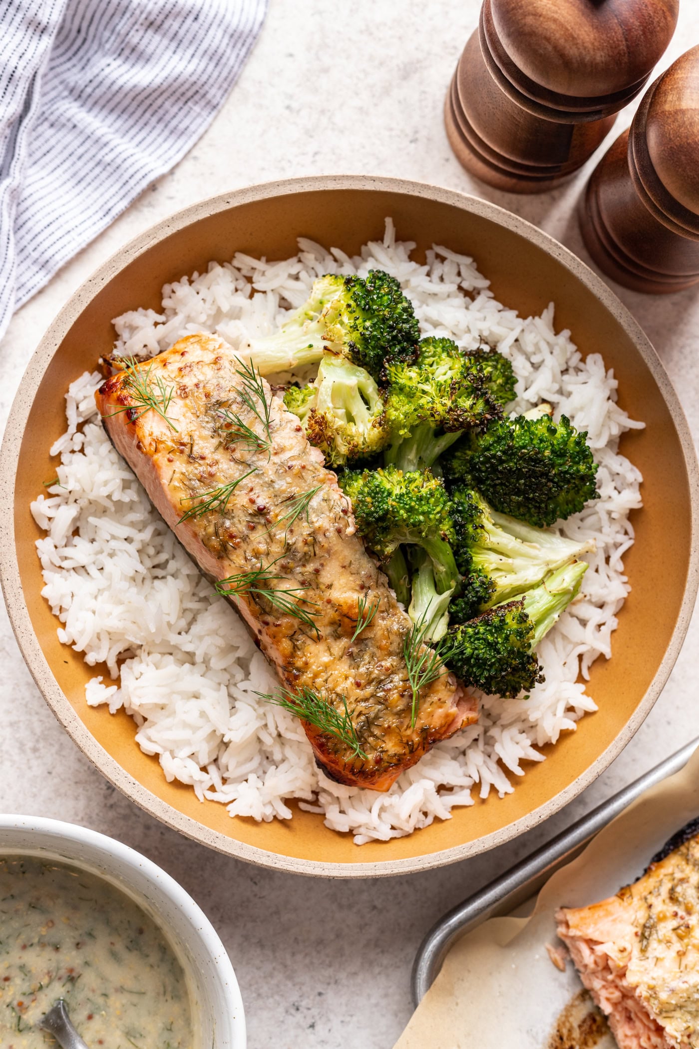 salmon, broccoli and rice in a bowl