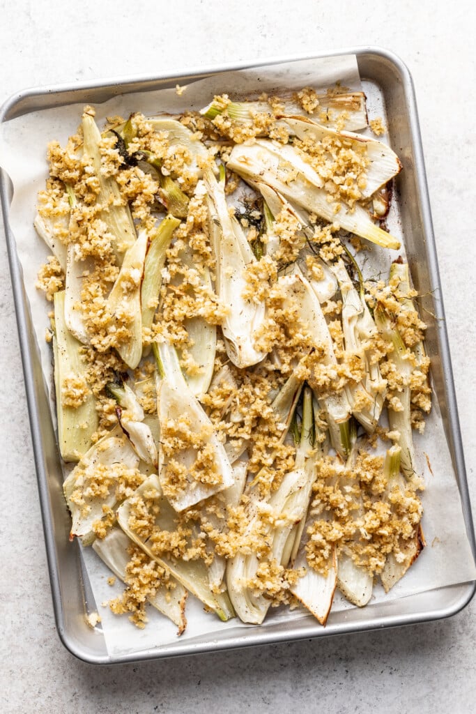 fennel on a sheet pan with breadcrumb topping