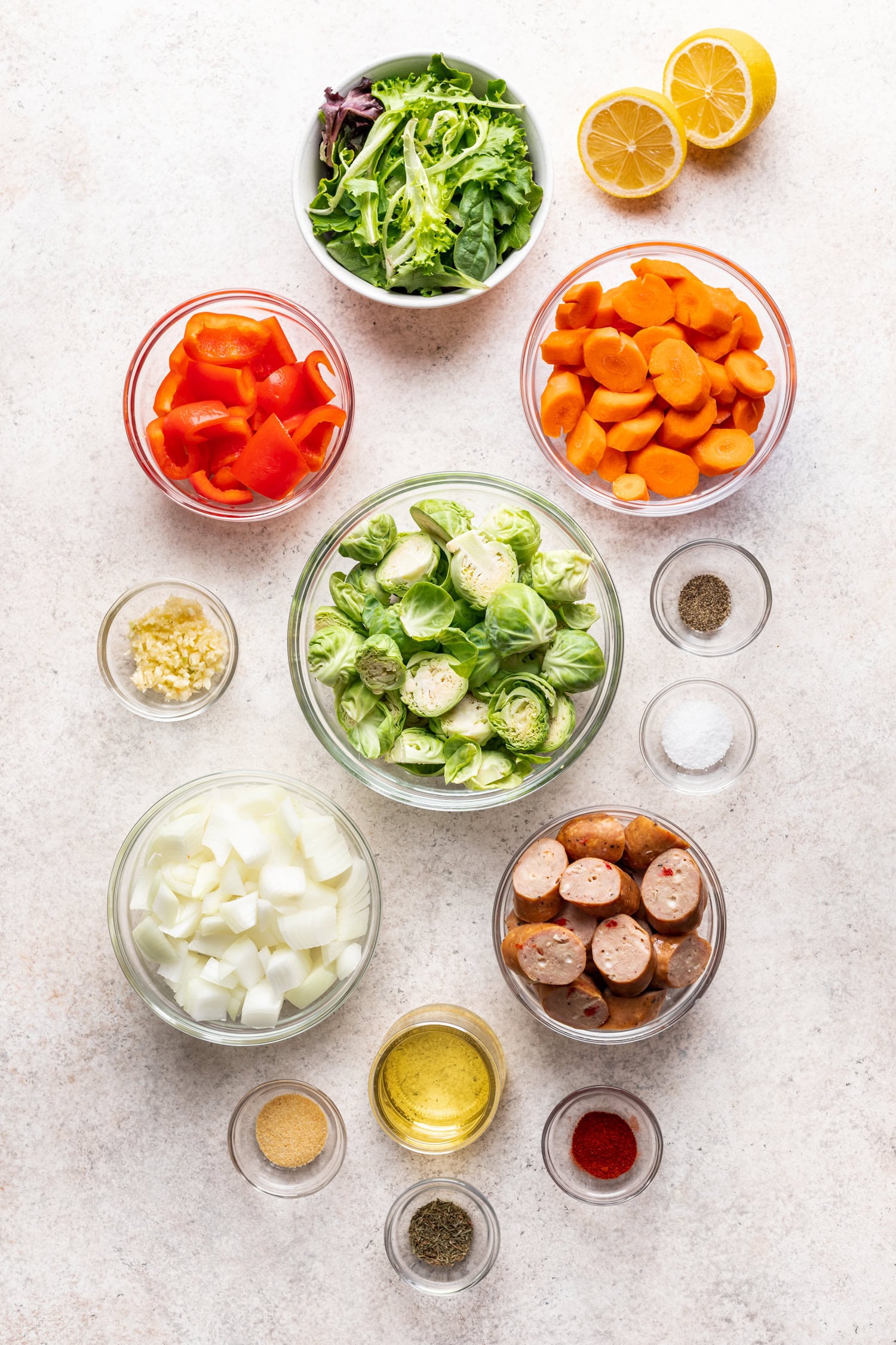bowls of ingredients on a grey background