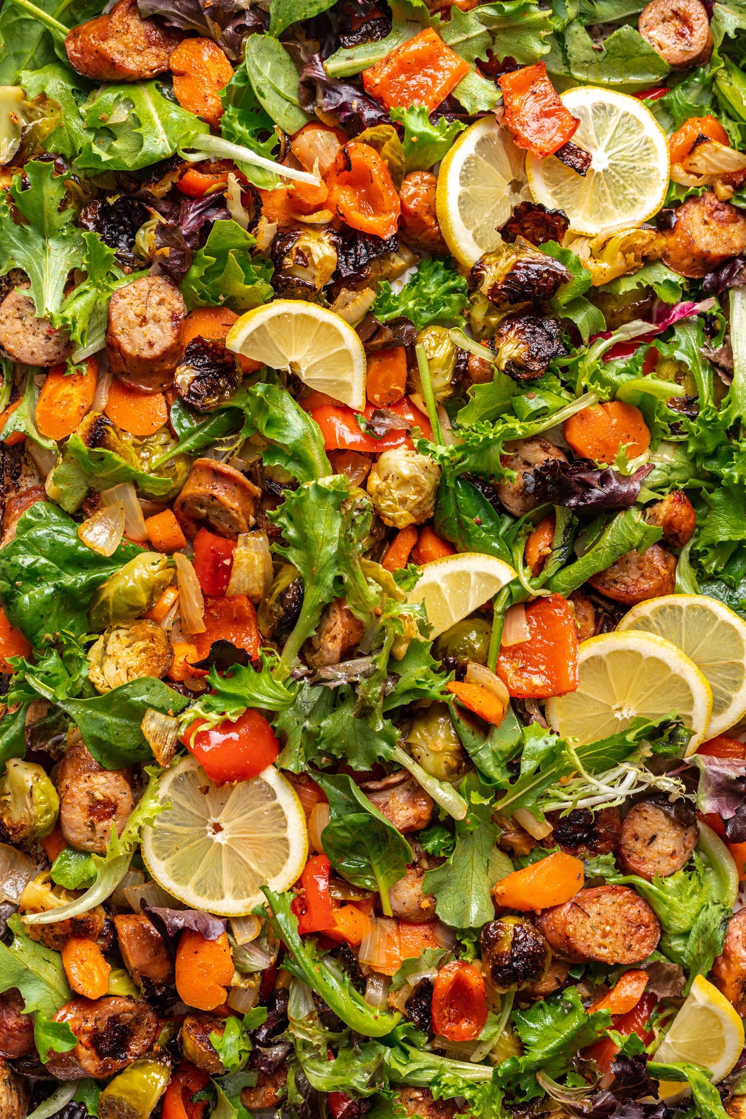 sheet pan with lots of veggies and chicken sausage