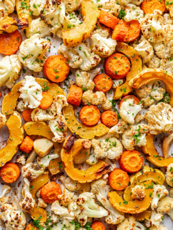 roasted cauliflower, carrots and squash on a sheet pan