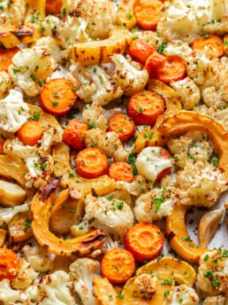 roasted veggies on a sheet pan such as carrots, squash and cauliflower
