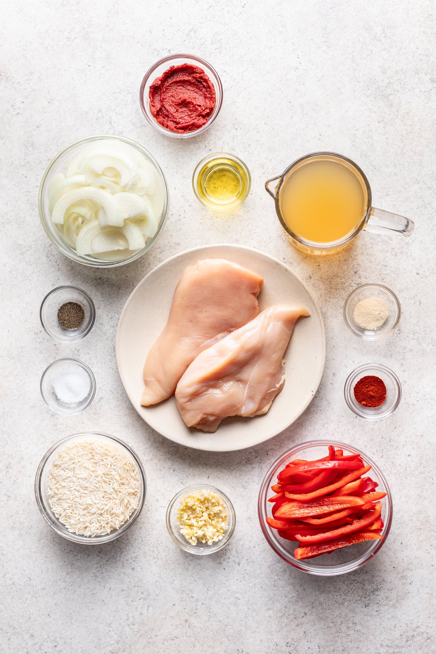 bowls of ingredients on a grey background