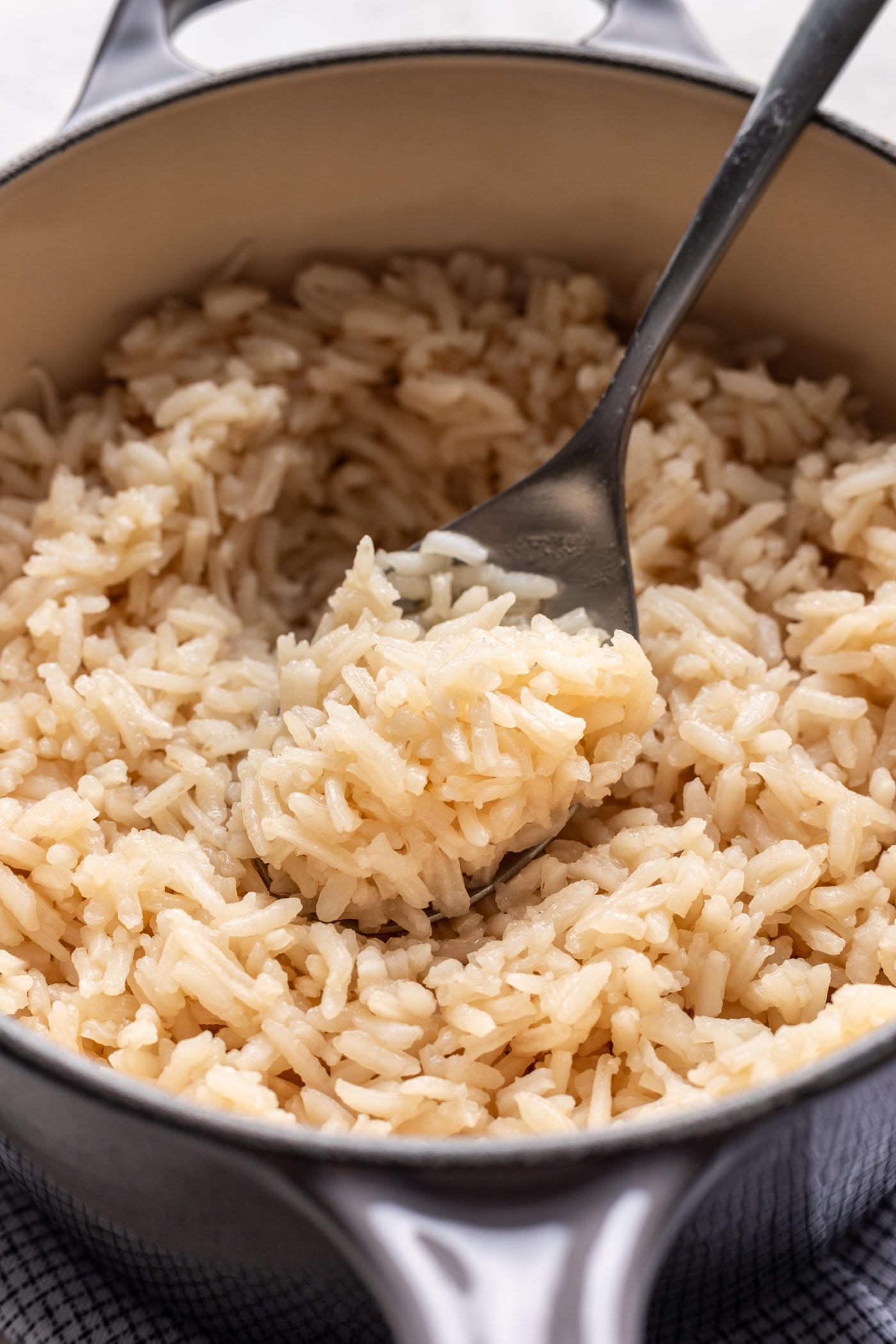 bone broth rice in a pot with a spoon