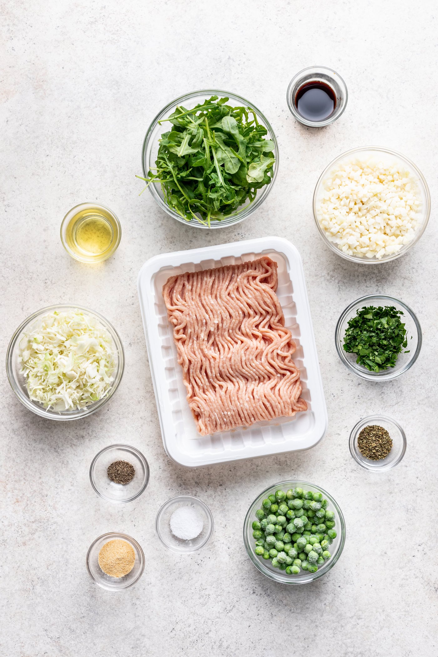 ingredients in bowls on a grey background