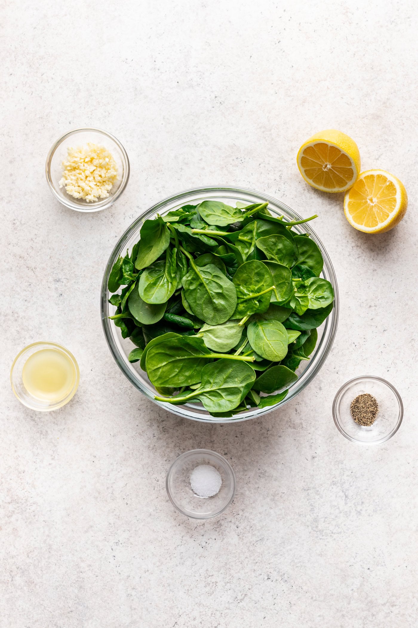 bowls of ingredients on a grey background