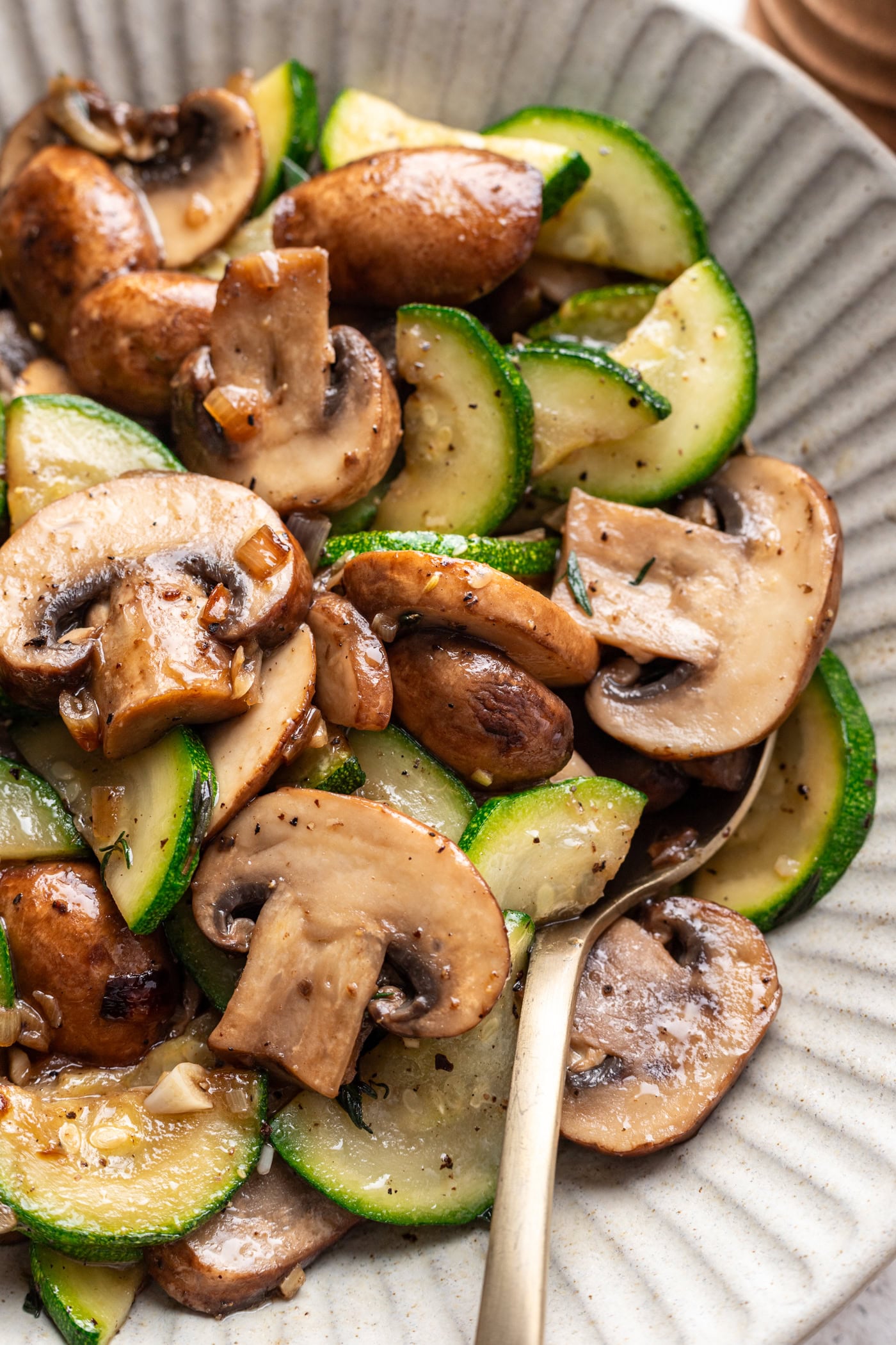 sautéed mushrooms and zucchini on a platter