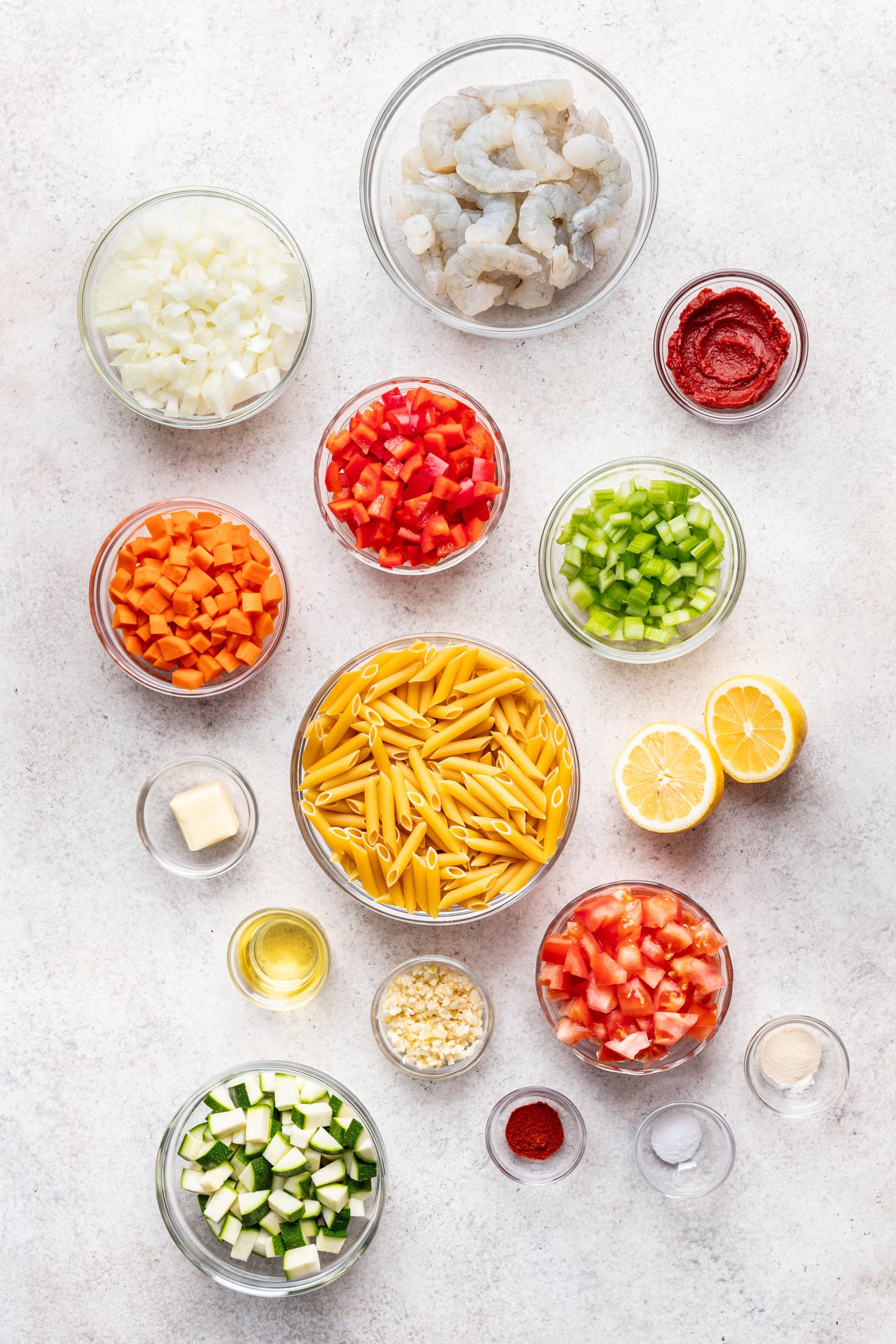 bowls of ingredients on a grey background