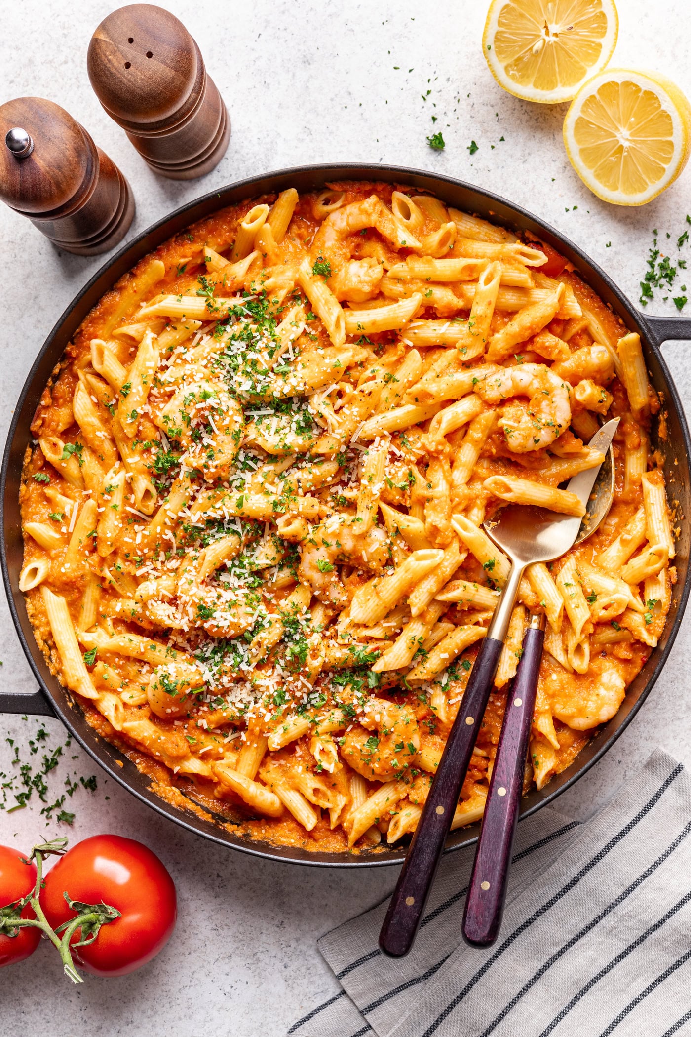 large bowl of pasta with 2 serving spoons