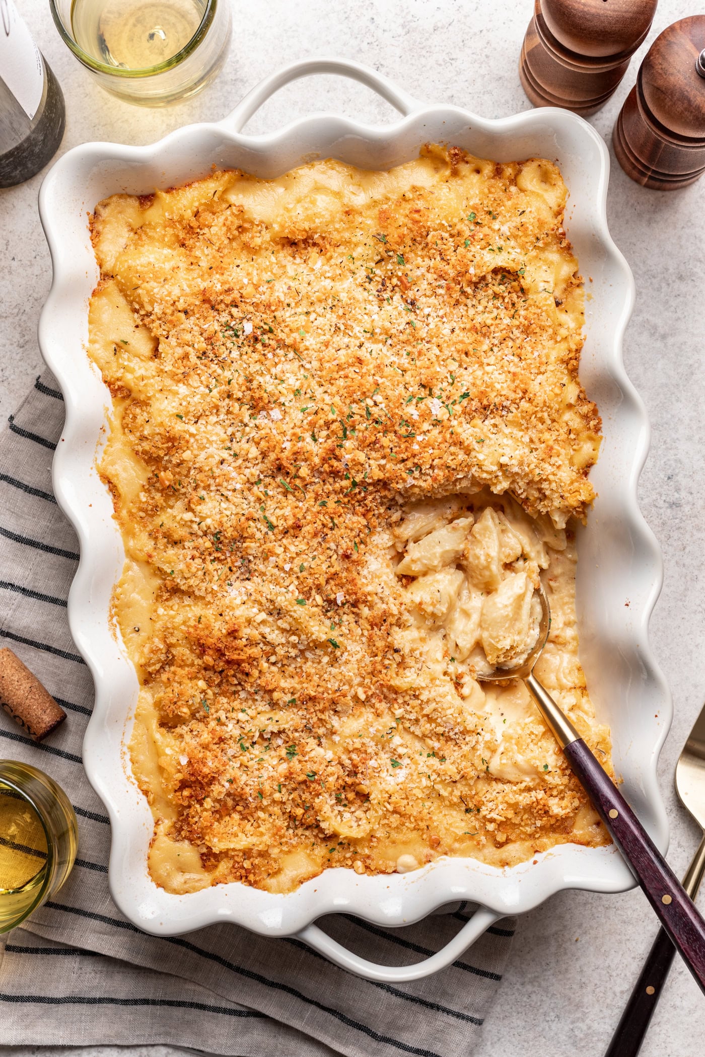 Butternut squash mac n cheese with a serving spoon